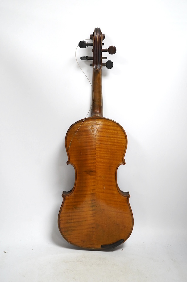 Two late 19th or early 20th century violins, one with case, back of largest measures 36cm. Condition - poor to fair